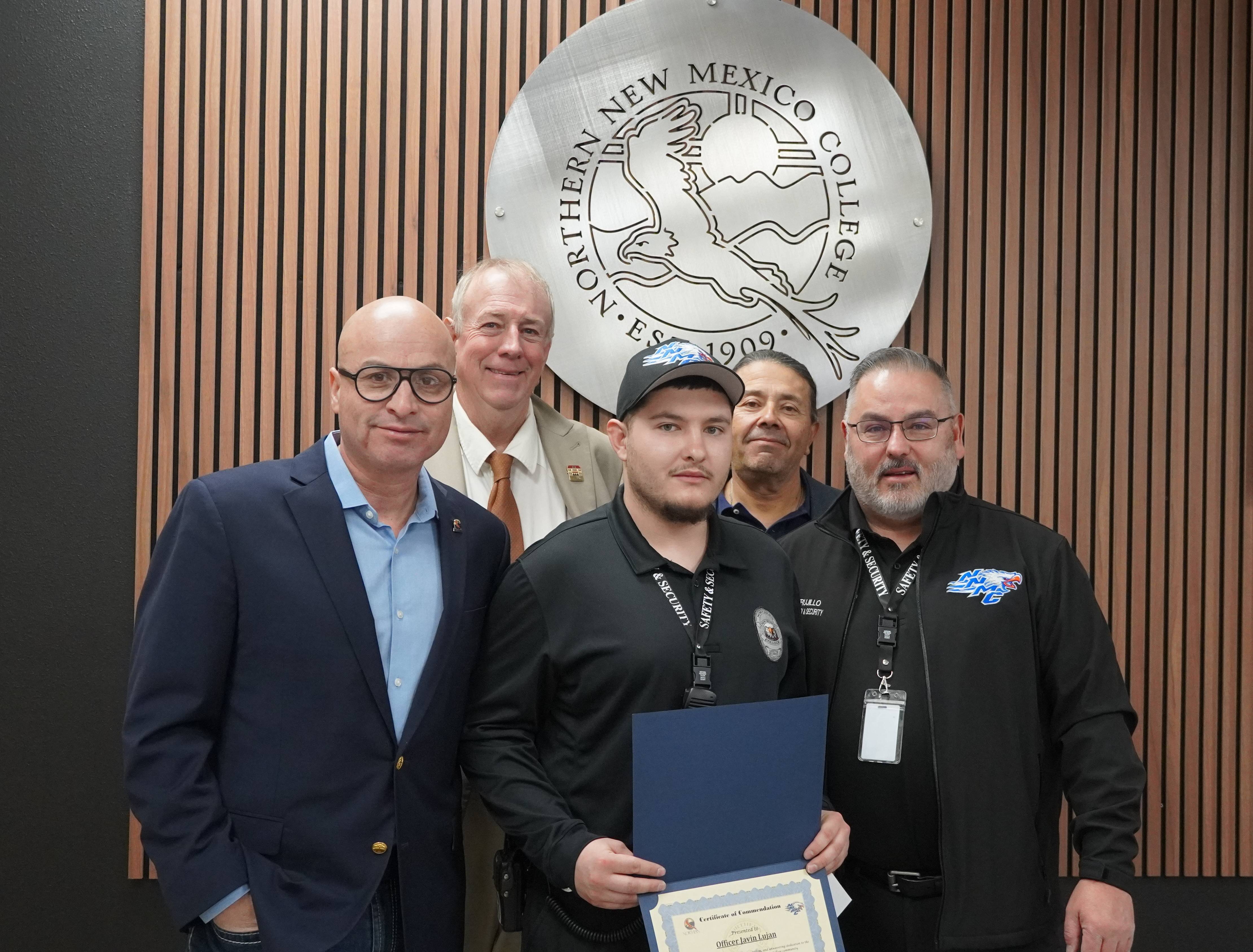 Officer Javin Lujan with President Balderas, NNMC Board President Michael Martin, board member Ron Lovato, and Henry “Geno” Trujillo Director, Safety & Security 